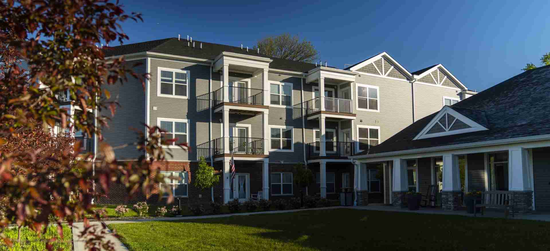 Exterior of three story apartments at Legacy Village