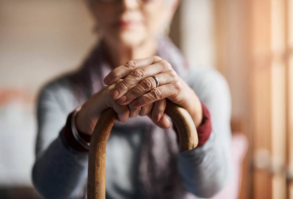elderly woman with cane