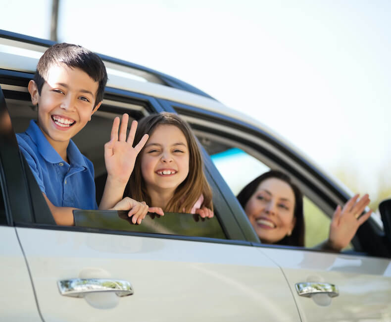 family in car