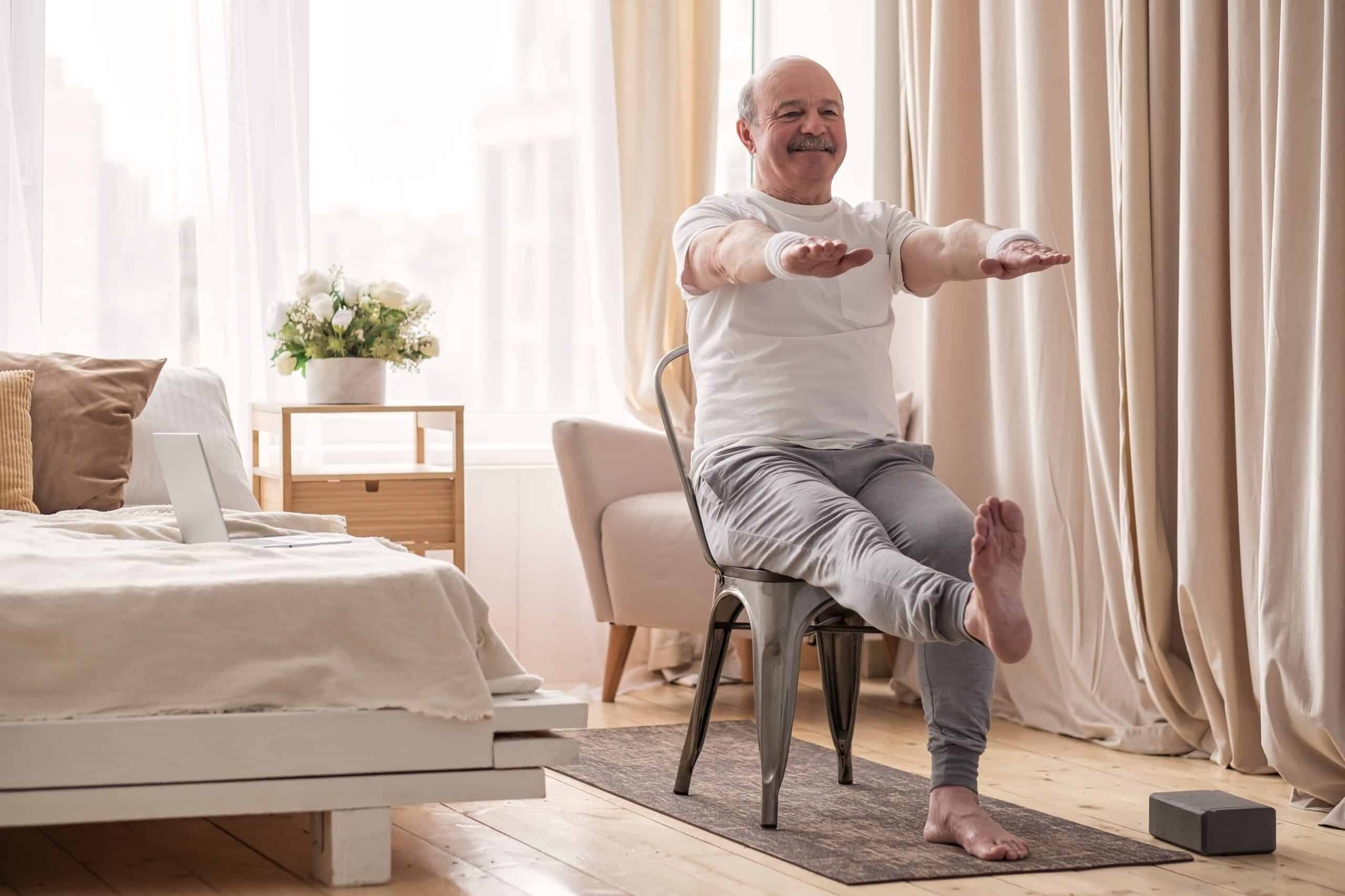 An older man doing balance exercises for seniors.