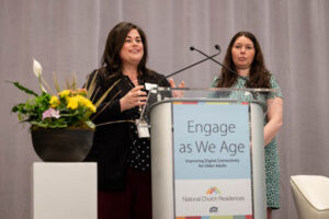 two women at a podium