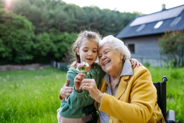 A senior with dementia engaging in an activity with a loved one.