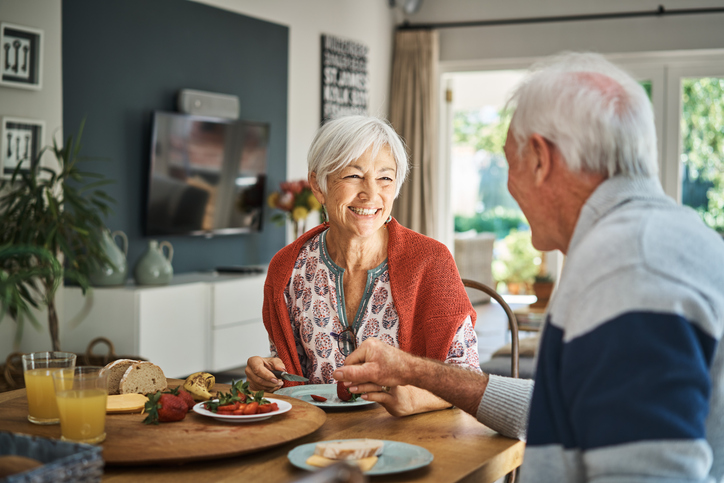 Senior couple having breakfast
