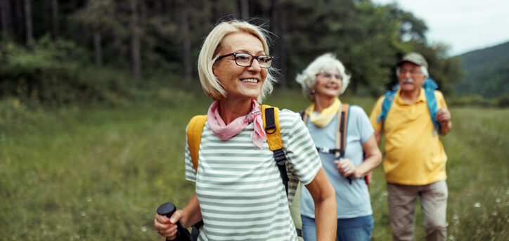 Mature woman enjoying her day in forest with friends