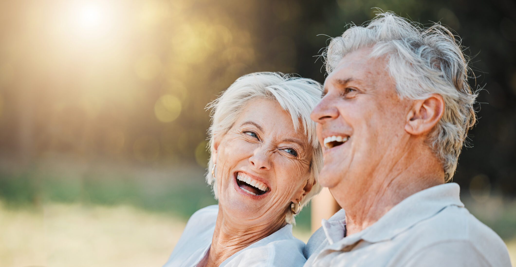 Senior couple enjoying sunrise