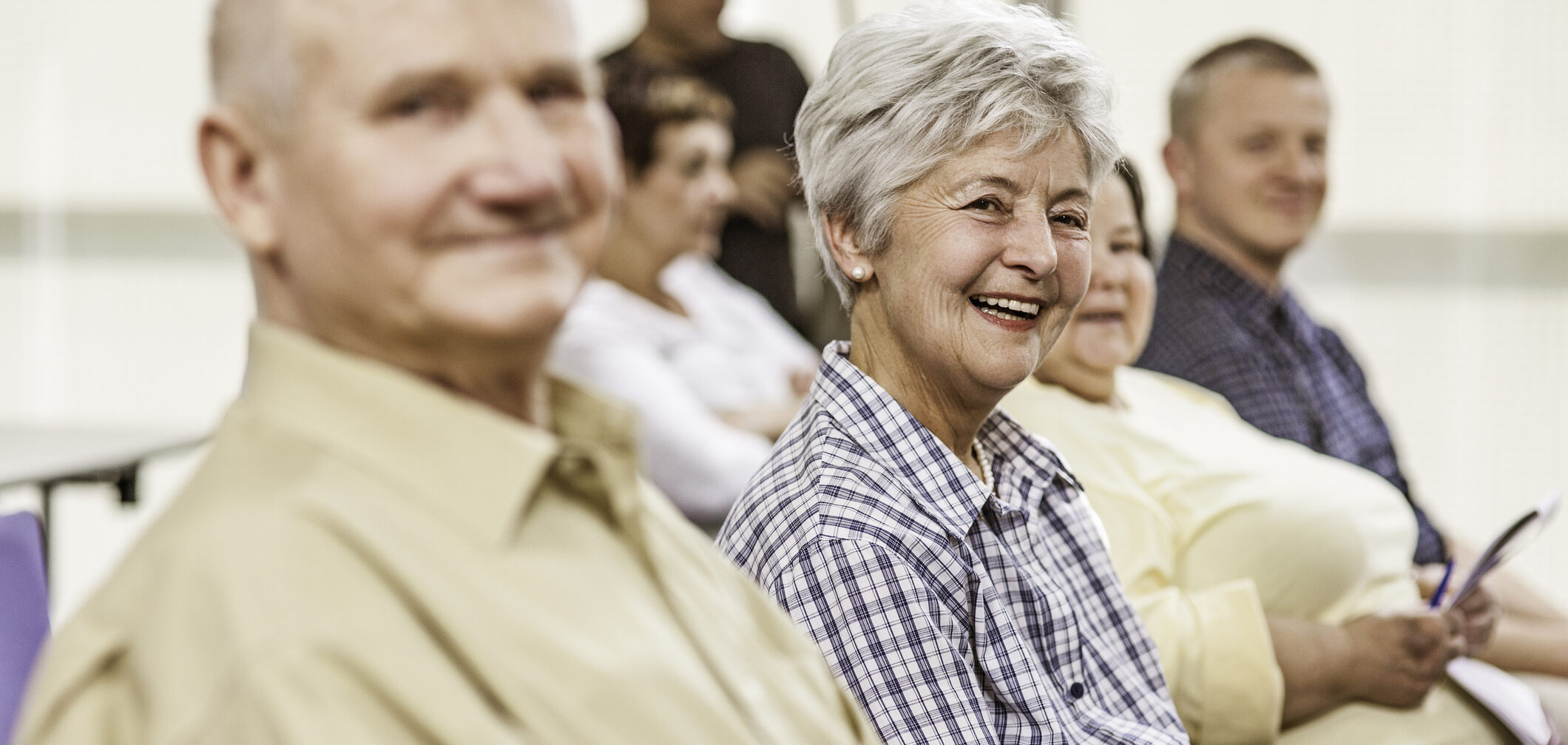 Seniors on the seminar, looking at camera.