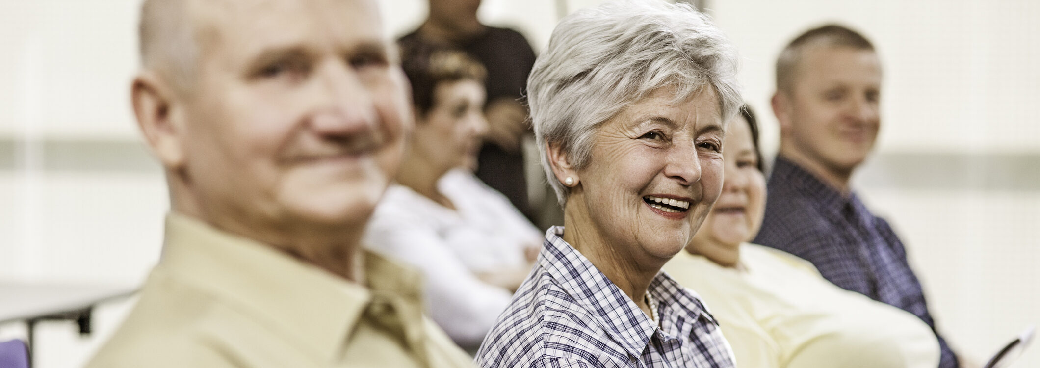 Seniors on the seminar, looking at camera.