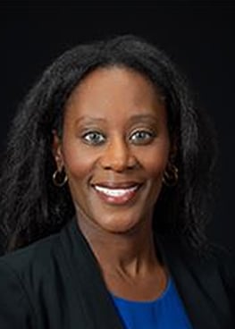 Woman in blazer smiling portrait