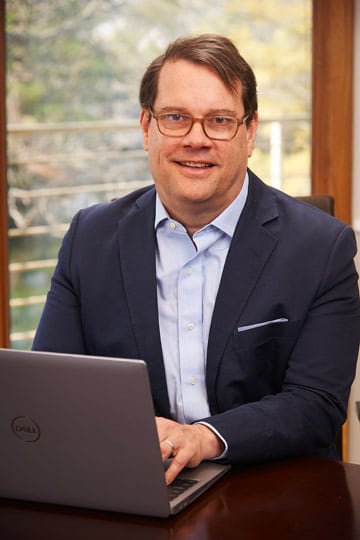 Man working on laptop in office