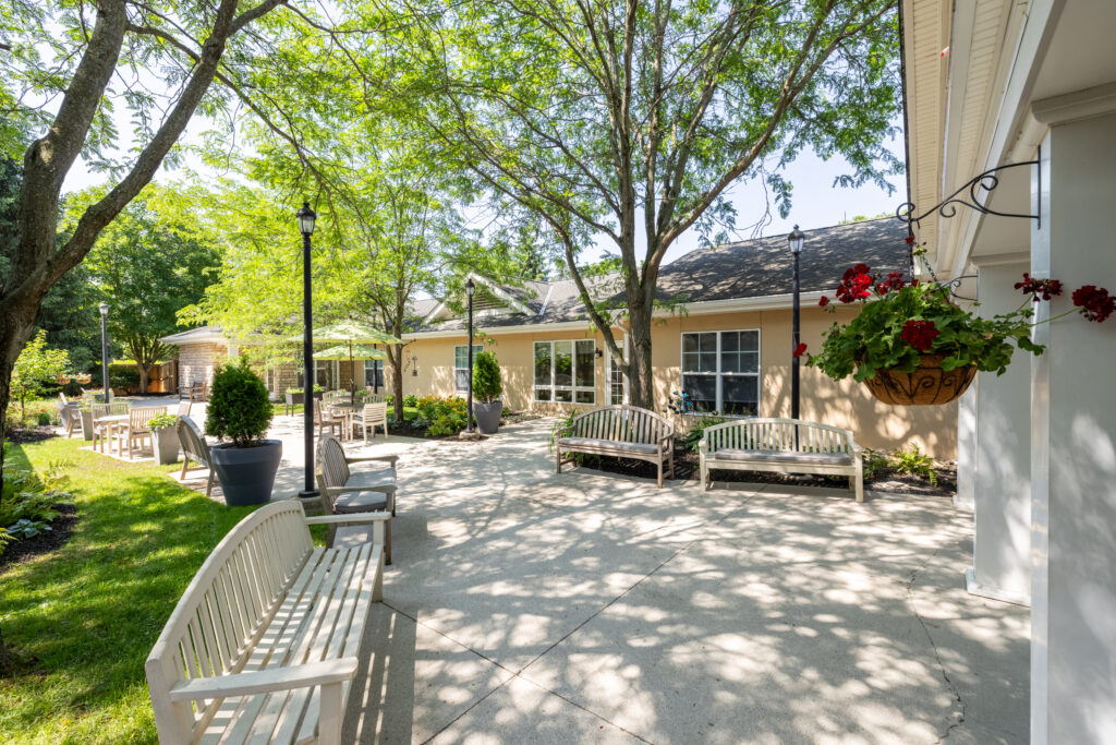 Exterior of a single-story home with a covered porch and driveway