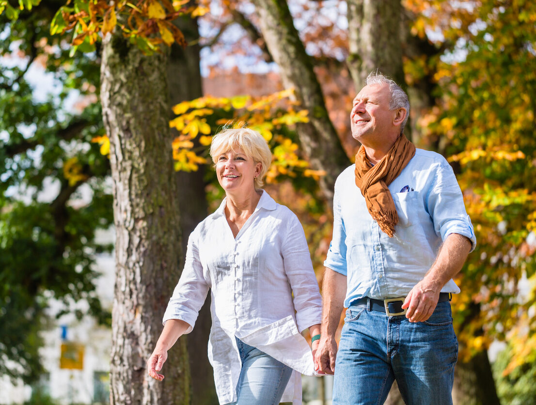 Seniors on a walk in fall