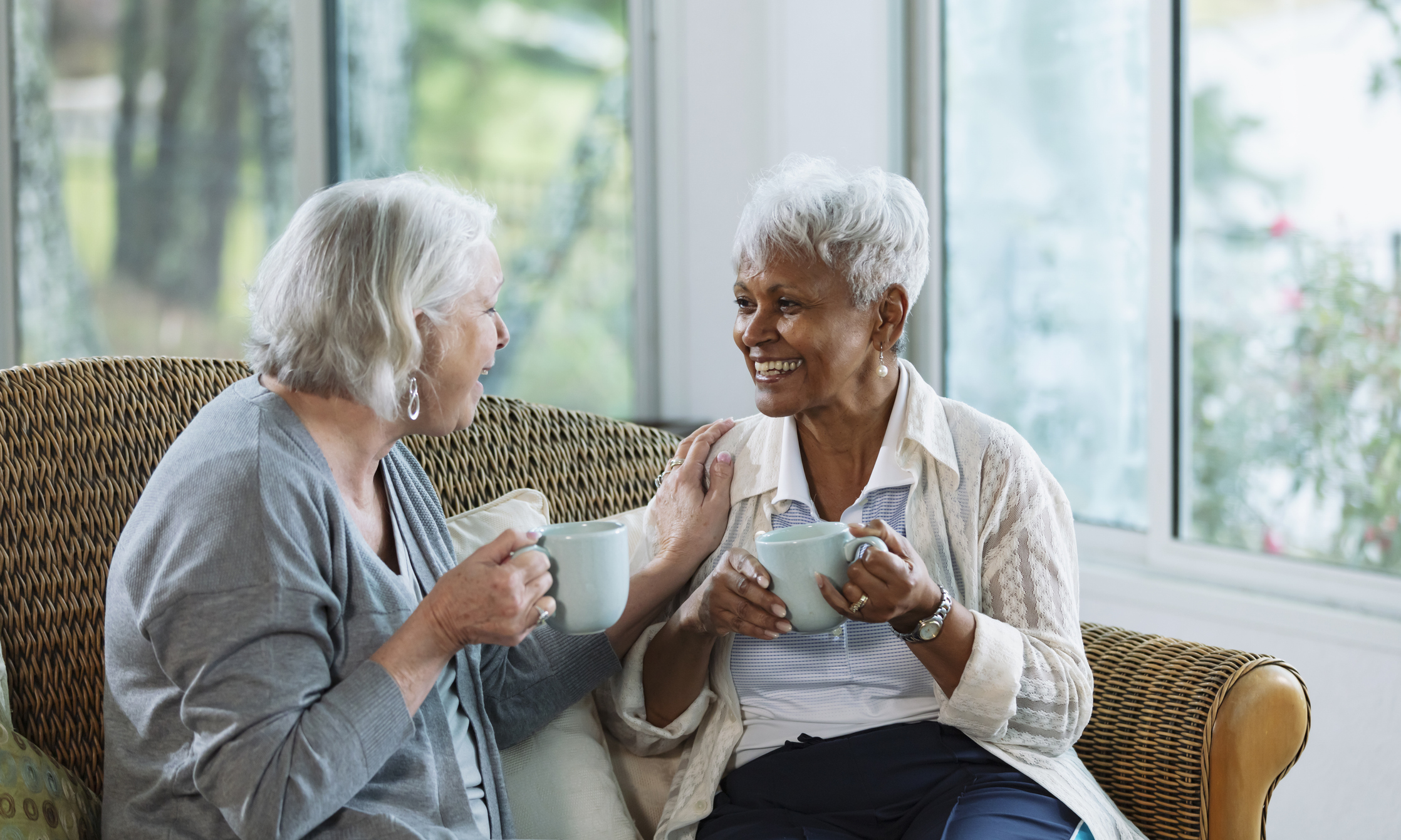 two senior women chatting