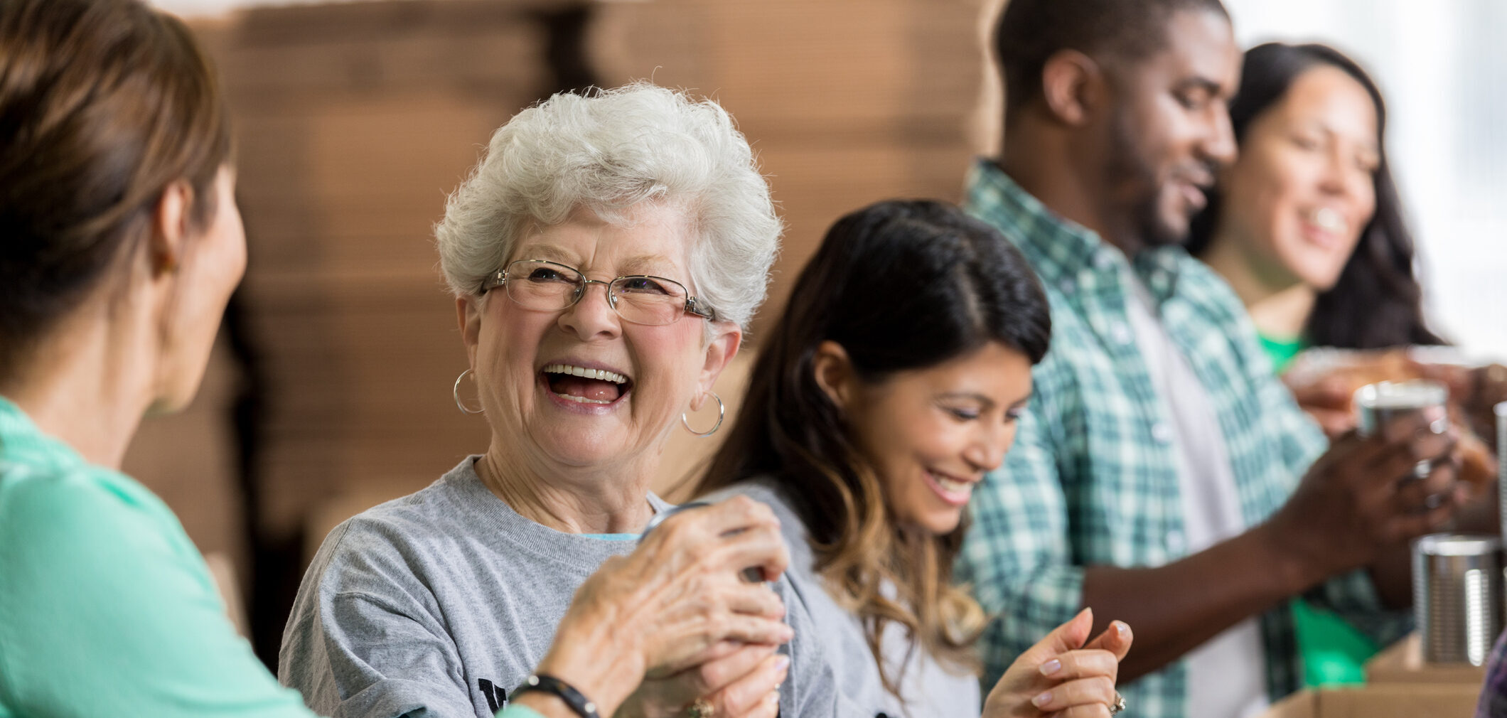 Senior woman volunteering with a group
