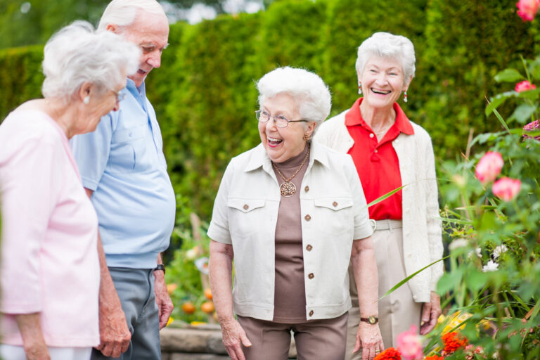 Senior couple touring a senior living community